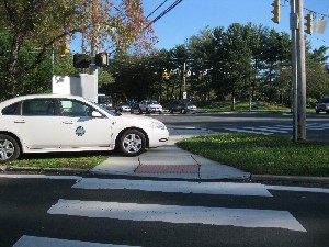 City car blocking three crosswalks