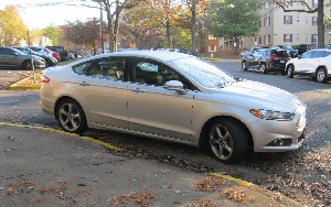 Wheelchair ramp blocked by parked car